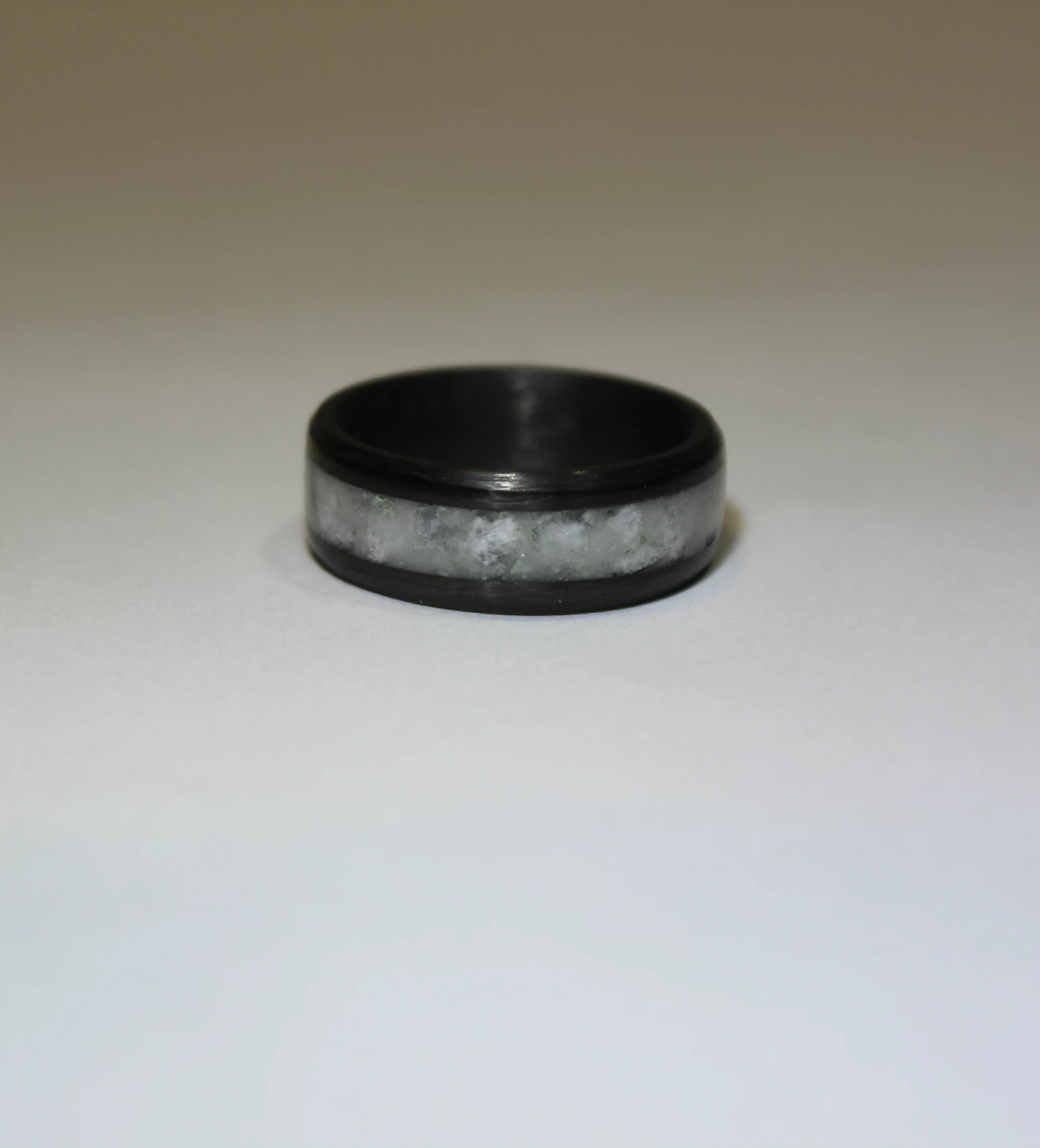 Glacial Shift: Carbon Fiber & White Marble